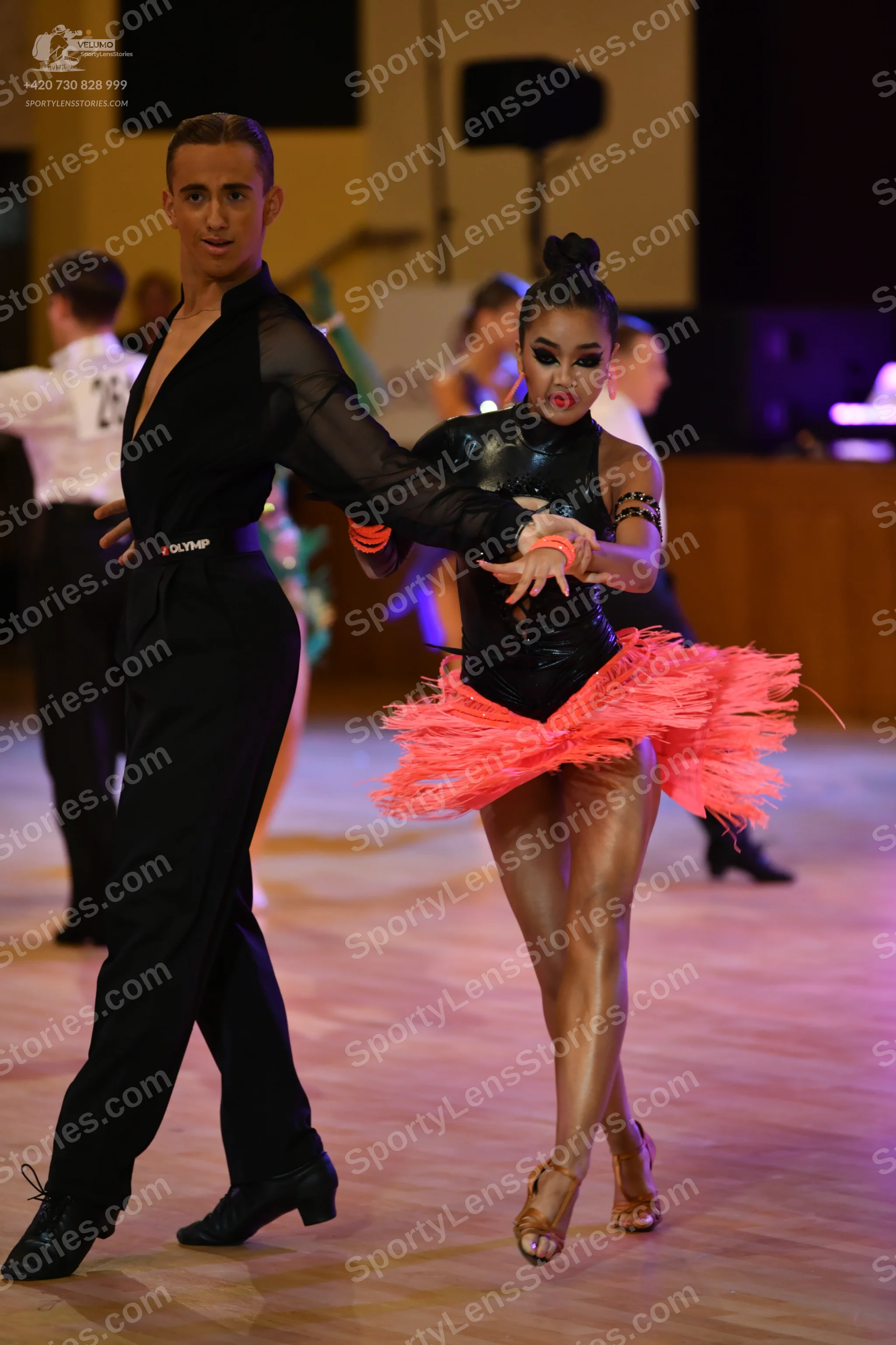 Dancesport competitor: ** Black tailsuit