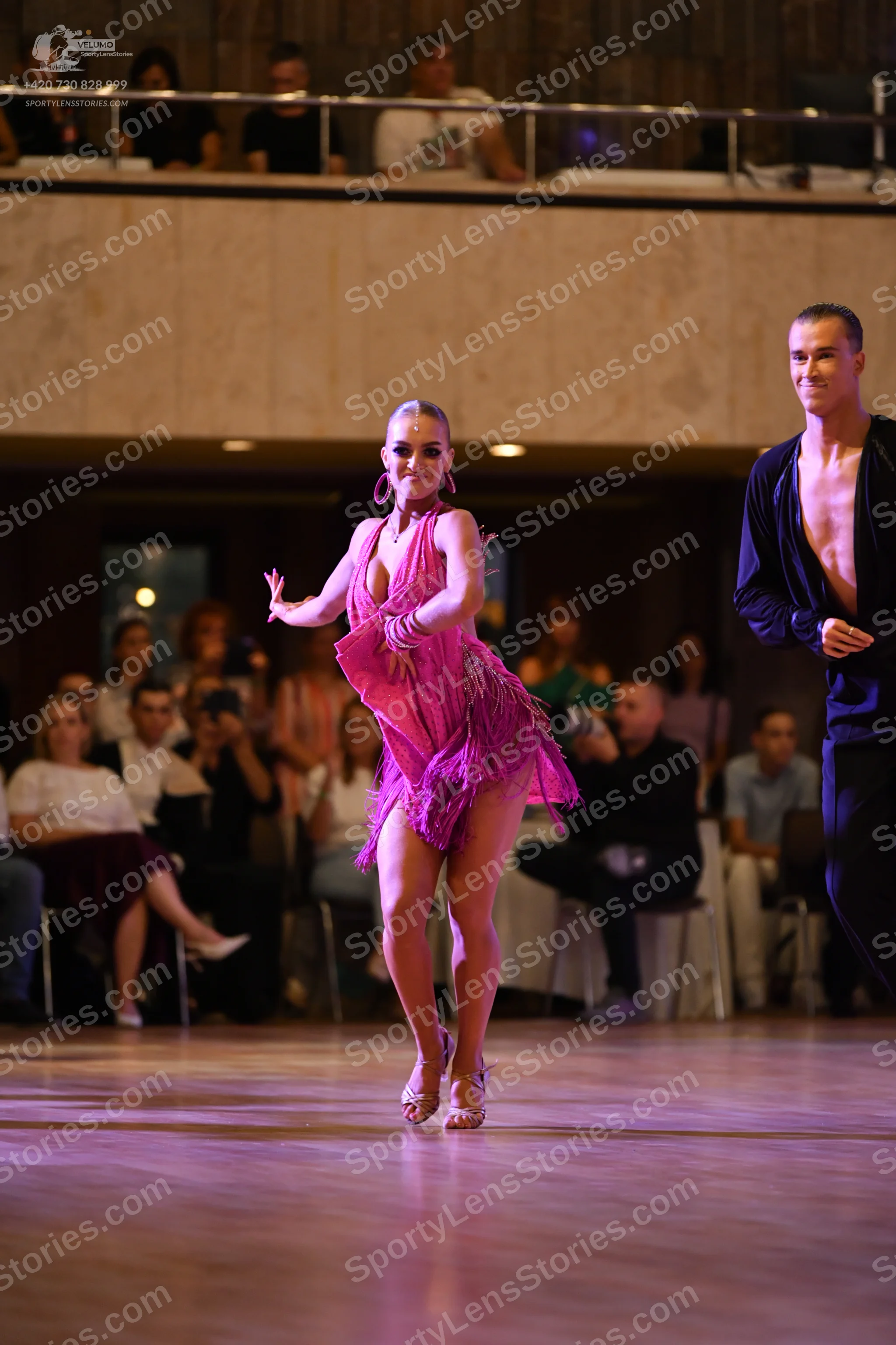 Dancesport competitor #8285: ** Red Latin dress
*   **Color:** Deep red
*   **Fabric:** Satin, with pink frin