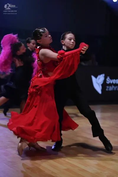 Dancesport competitor: Male dancer: black dance suit and shirt