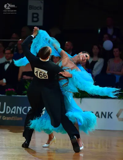 Dancesport competitor #166: Male dancer: black long-sleeved top and black trousers