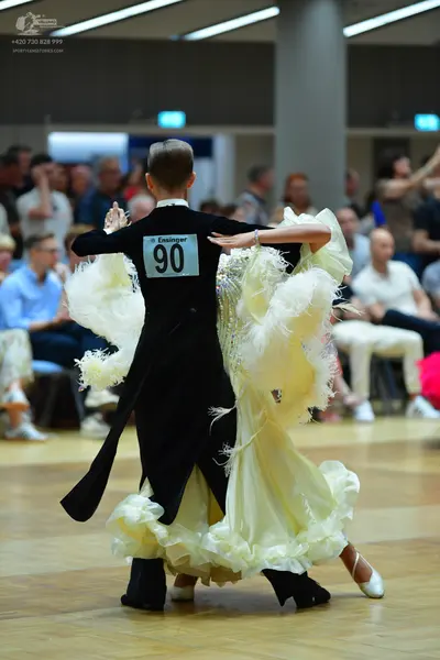 Dancesport competitor #90: Male dancer: black ballroom tailcoat