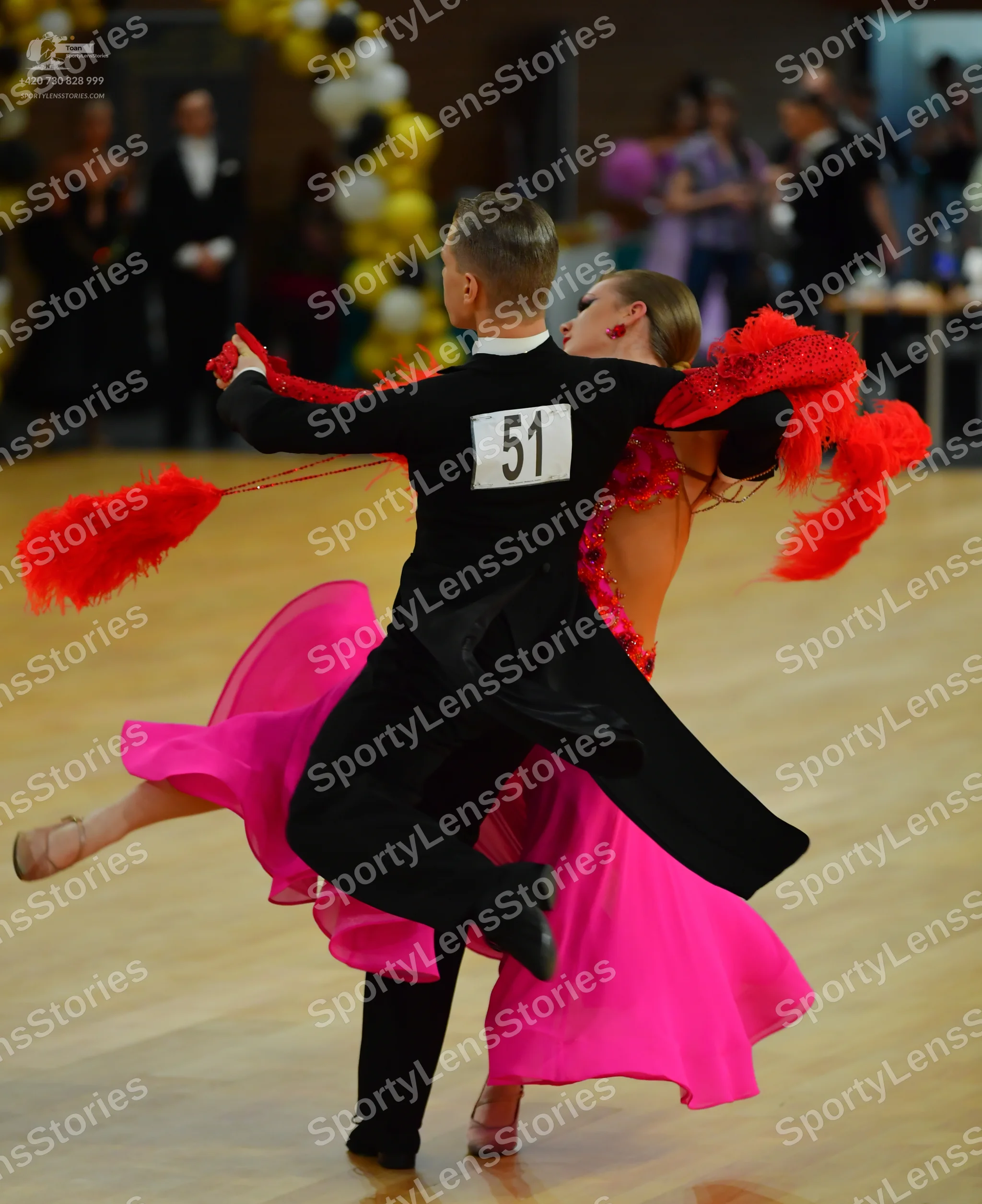 Dancesport competitor #51: Male:** Black tail suit with dark grey sequin lapels