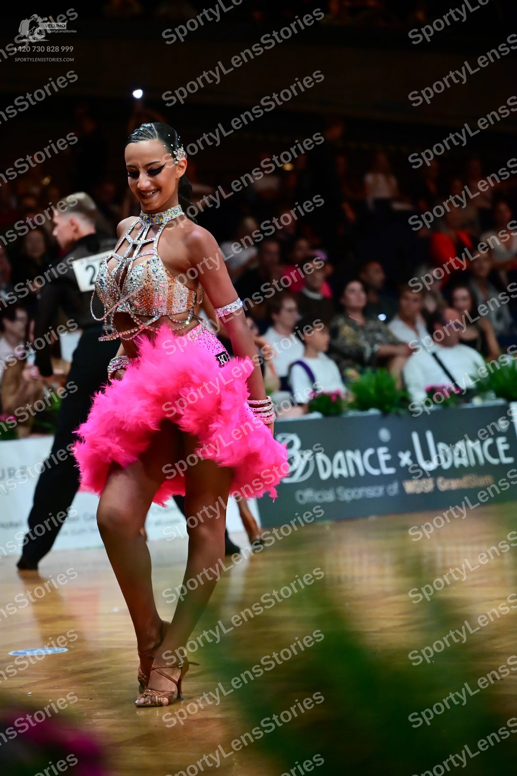 Dancesport competitor #29: Female dancer: nude-colored Latin dance top with silver sequins and crystals, a 