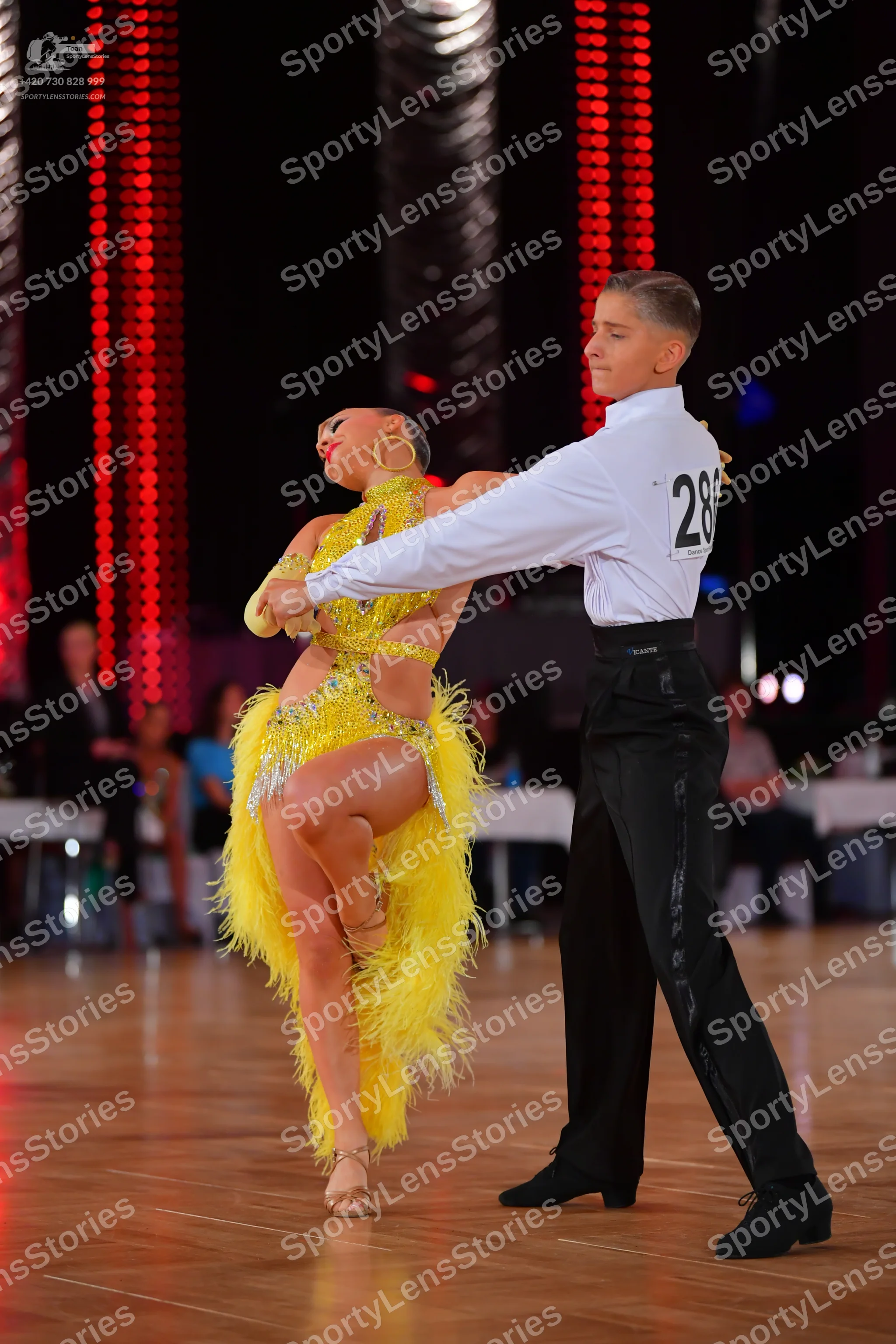 Dancesport competitor #28: Male dancer: white long-sleeved shirt and black trousers
