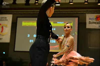 Dancesport competitor: Male dancer: black suit