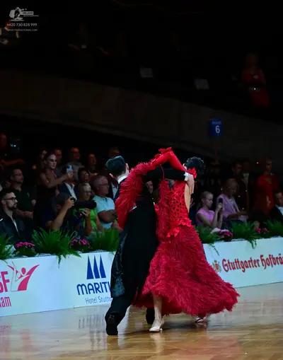 Dancesport competitor: Male dancer: black ballroom suit