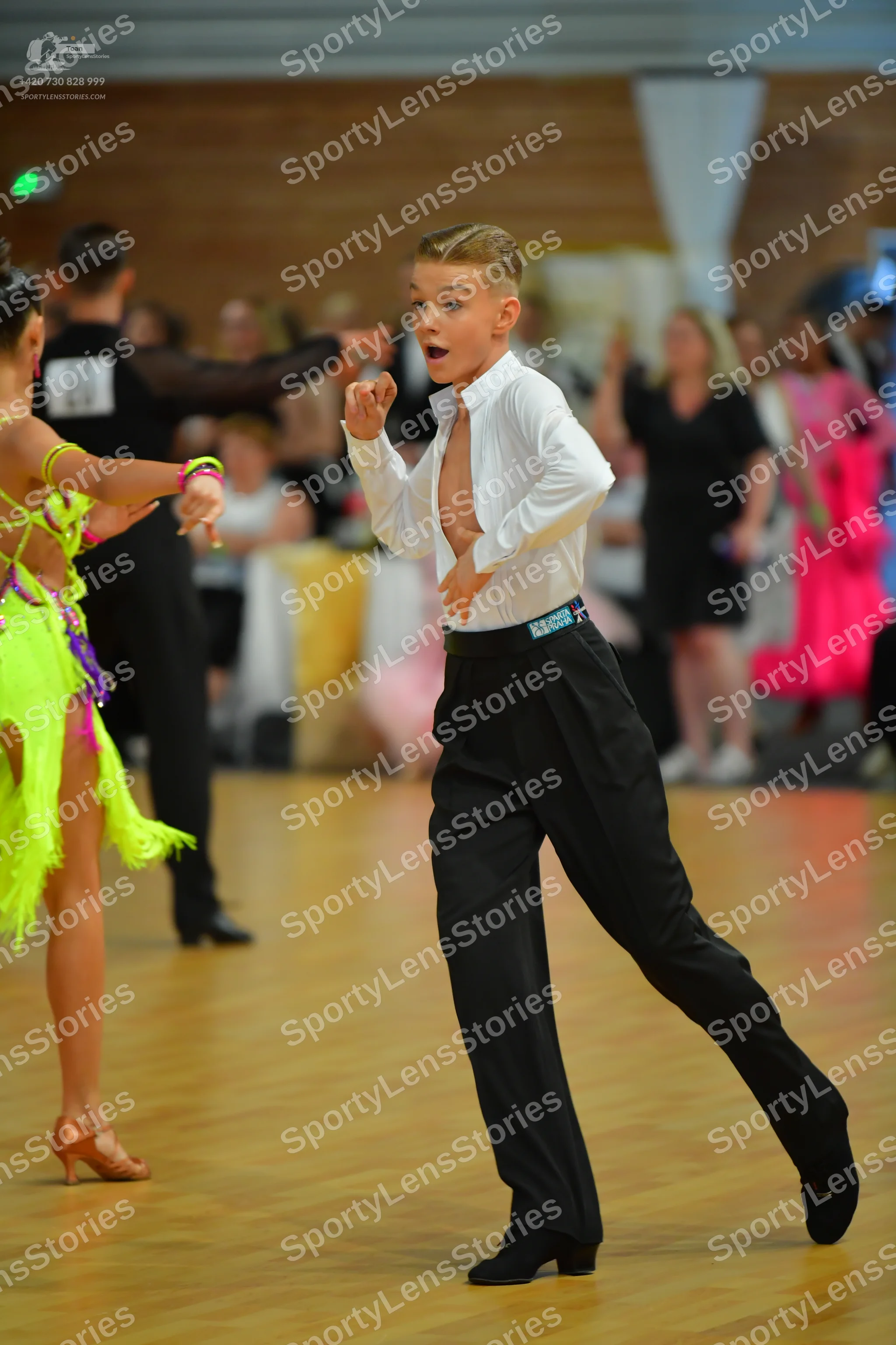 Dancesport competitor: ** Black tailsuit