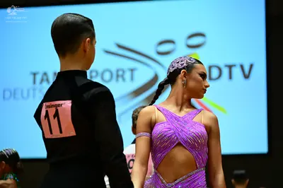 Dancesport competitor #11: Male dancer: black suit