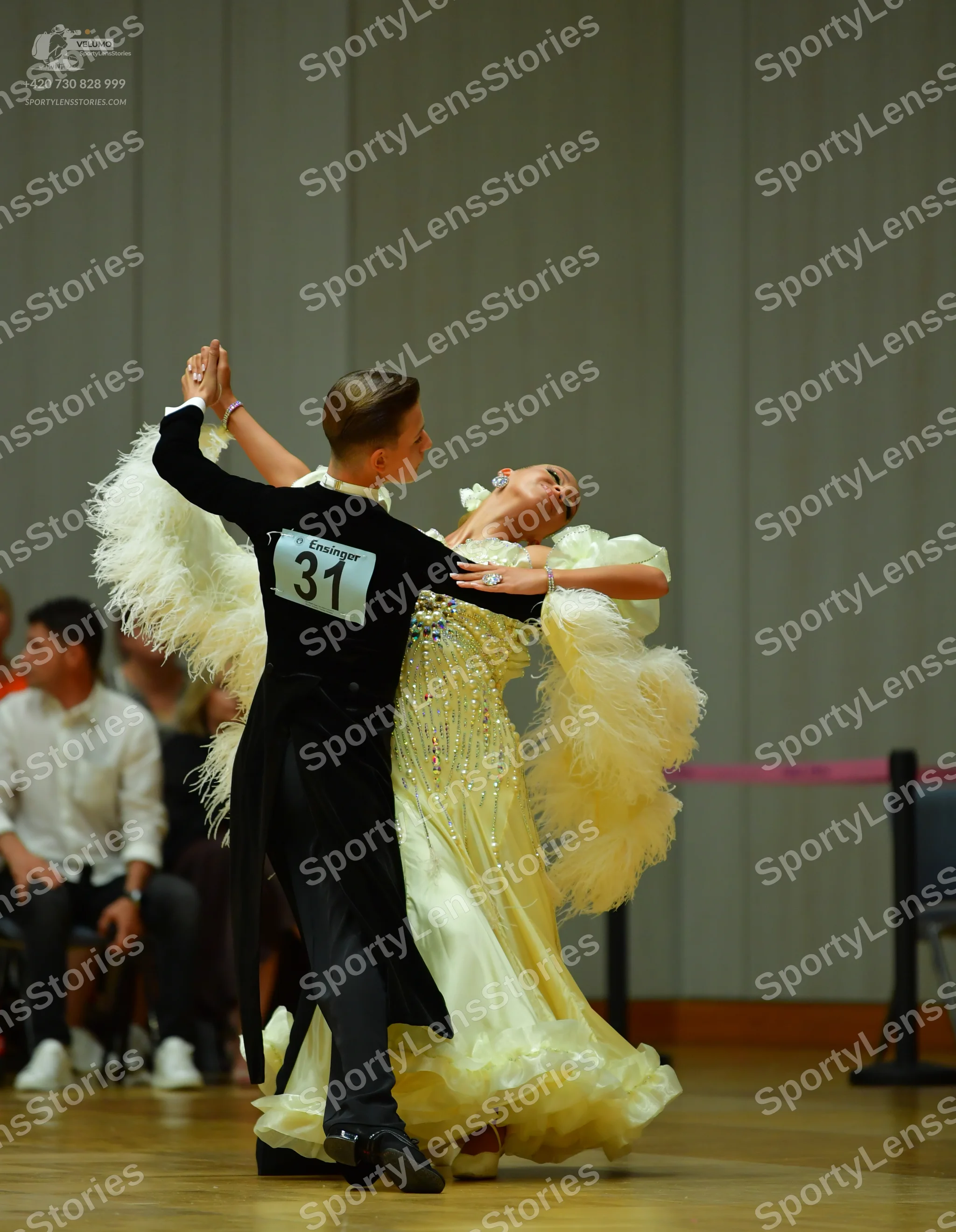 Dancesport competitor: Male dancer: black long-sleeved top and trousers