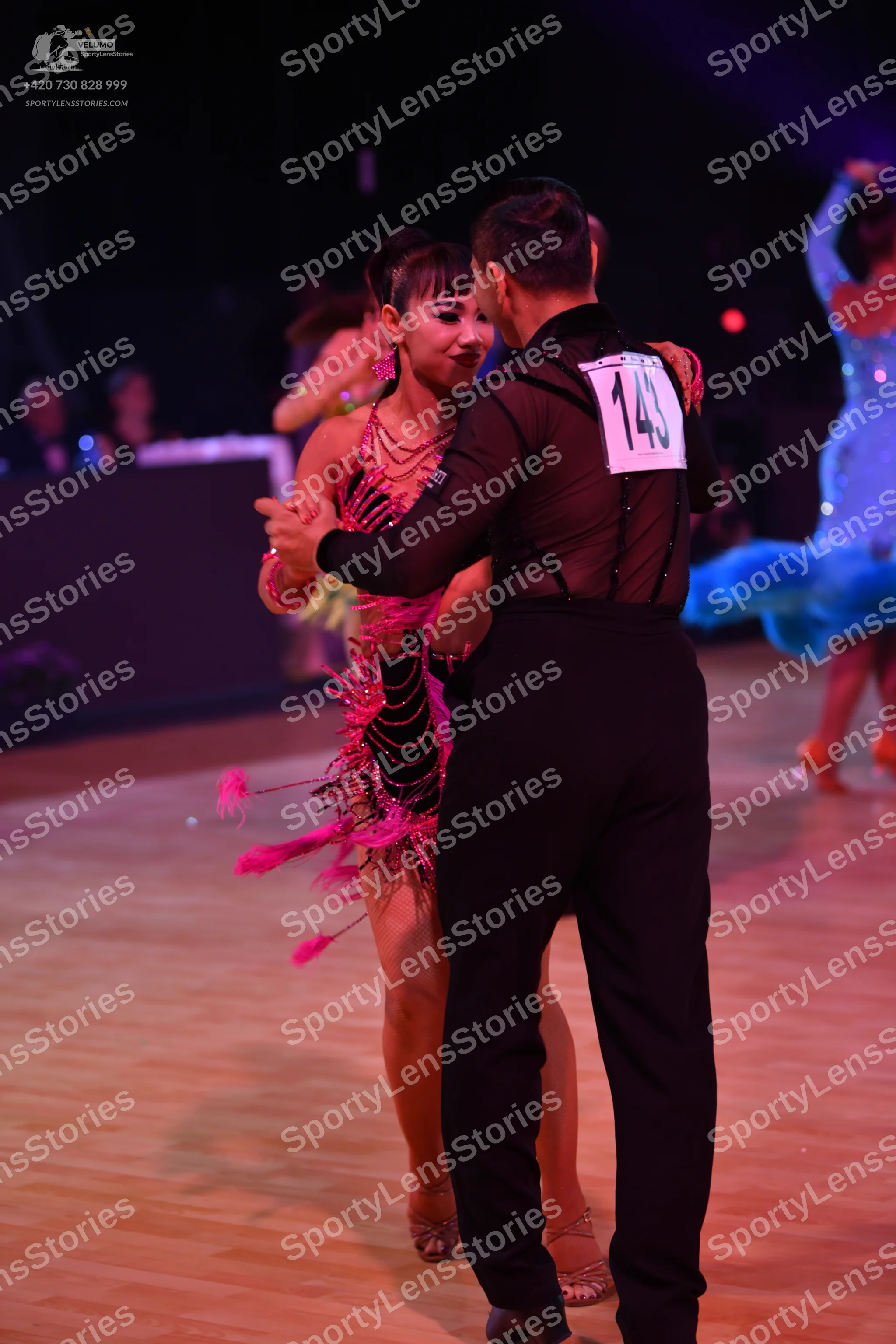 Dancesport competitor: Male dancer: black long-sleeved shirt and black trousers
