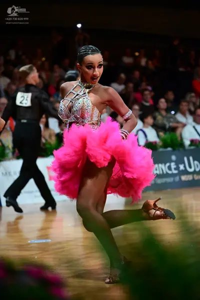 Dancesport competitor #25: Male dancer: black long-sleeved dance shirt and black trousers