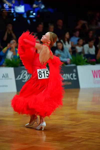 Dancesport competitor #815: Female dancer: red latin dress with fringe