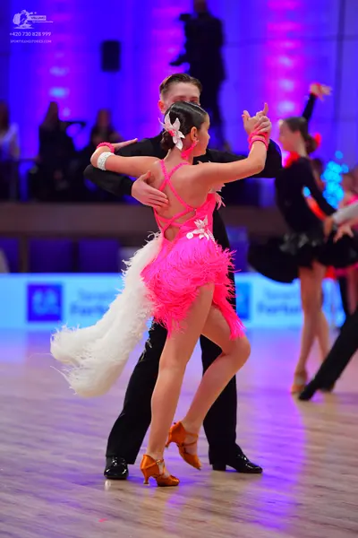Dancesport competitor: Male dancer: black suit
