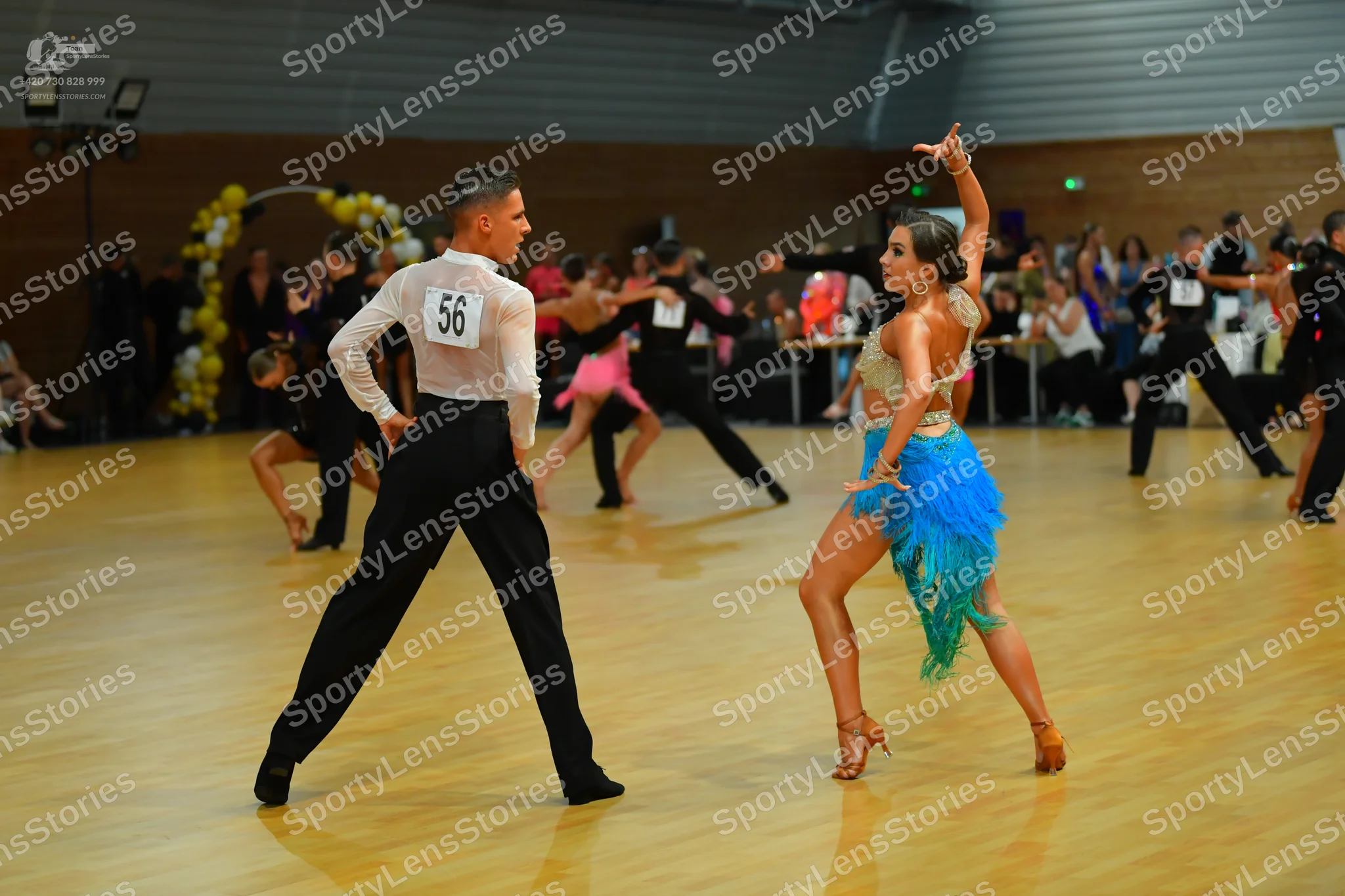 Dancesport competitor #56: ** Black tailsuit with sequin lapels