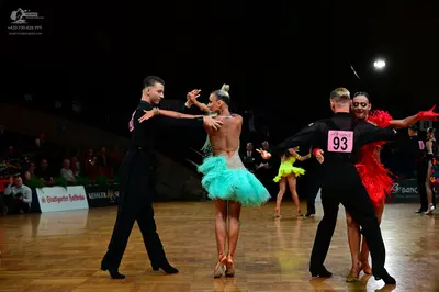 Dancesport competitor #93: Male dancer: black suit