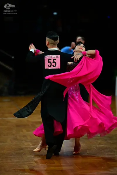 Dancesport competitor #55: Male dancer: black long-sleeved top and black trousers