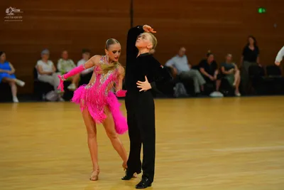 Dancesport competitor: ** Black tail suit