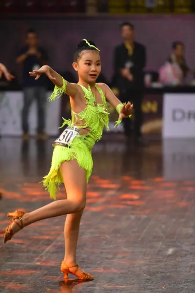 Dancesport competitor #30: Female dancer: lime green Latin dress with fringe