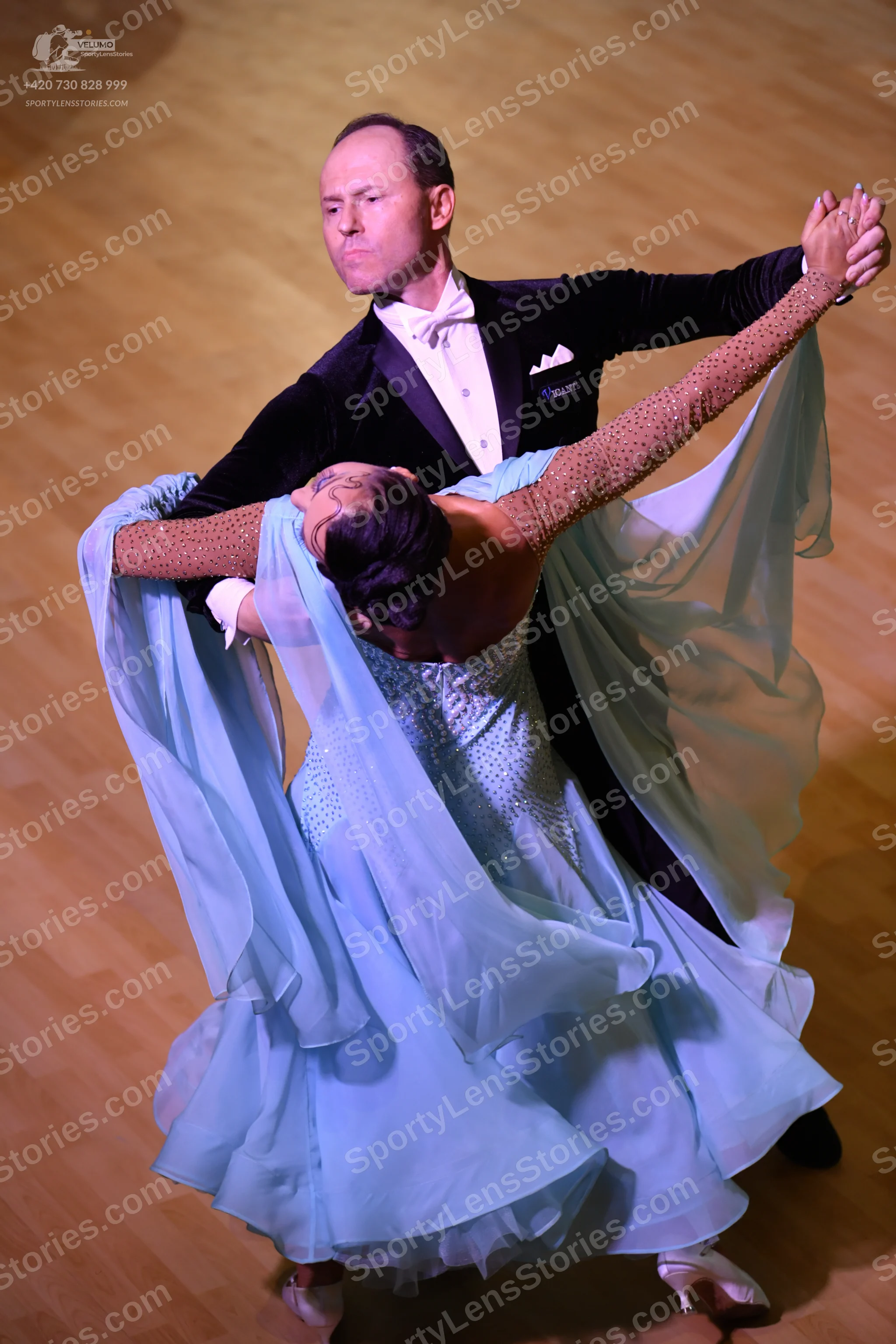 Dancesport competitor: ** Black tail suit
