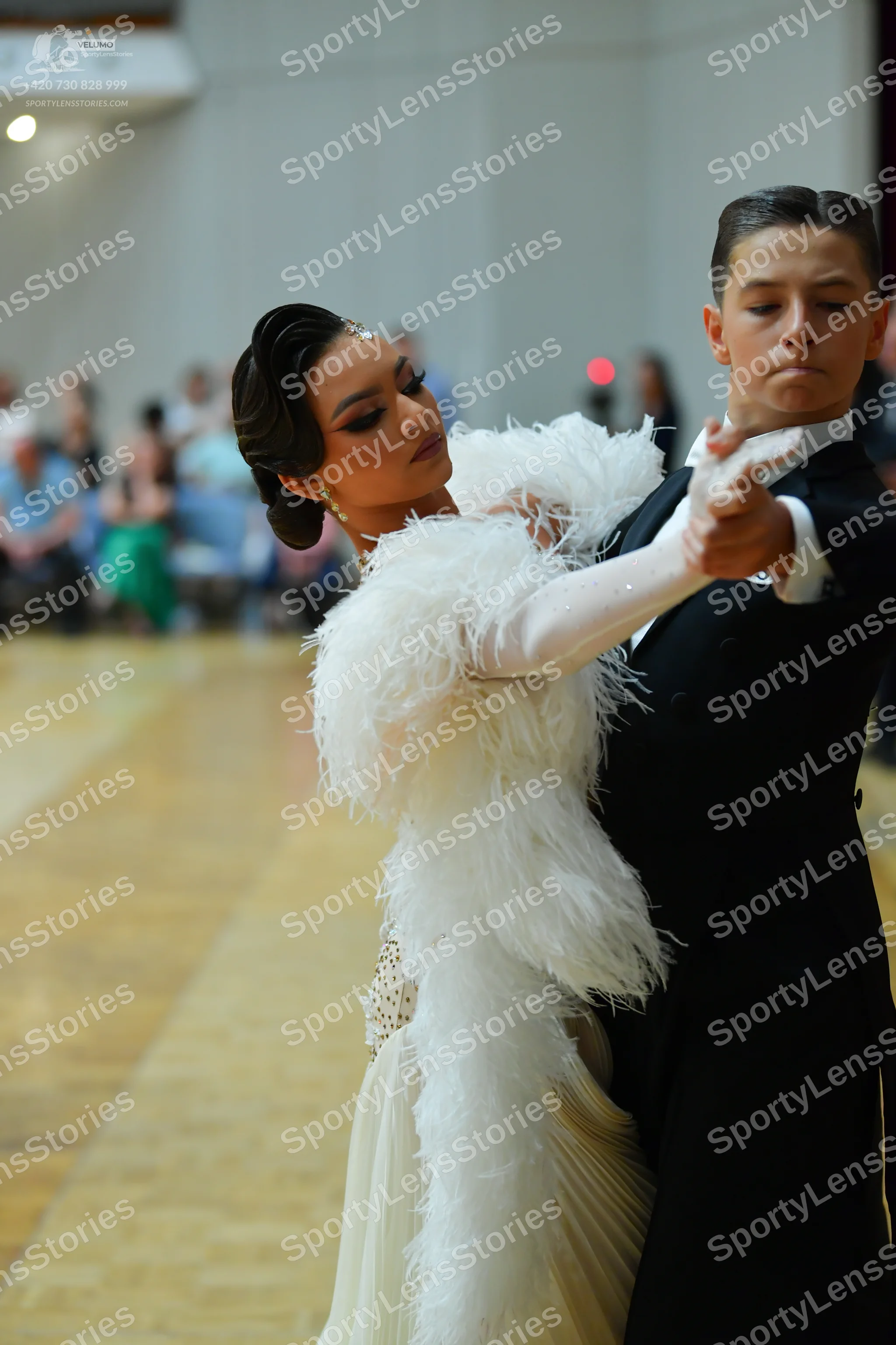 Dancesport competitor: Male dancer: black suit with a white shirt