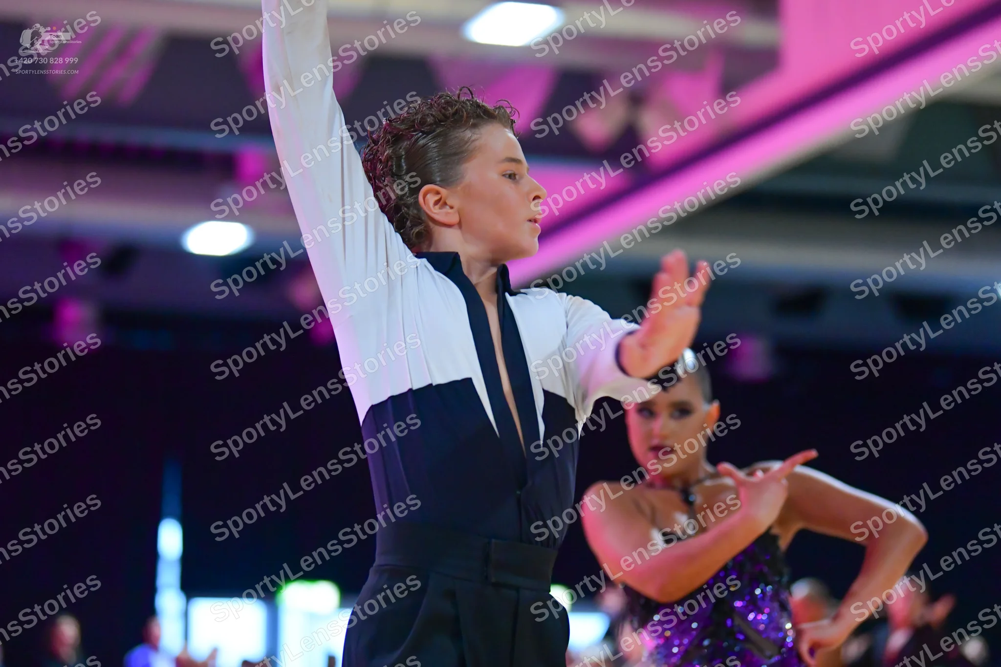 Dancesport competitor: Male dancer: white and black long-sleeved dance shirt