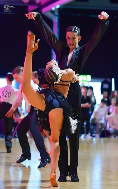 Dancesport competitor #620: Male dancer (620): white long-sleeved shirt and black trousers