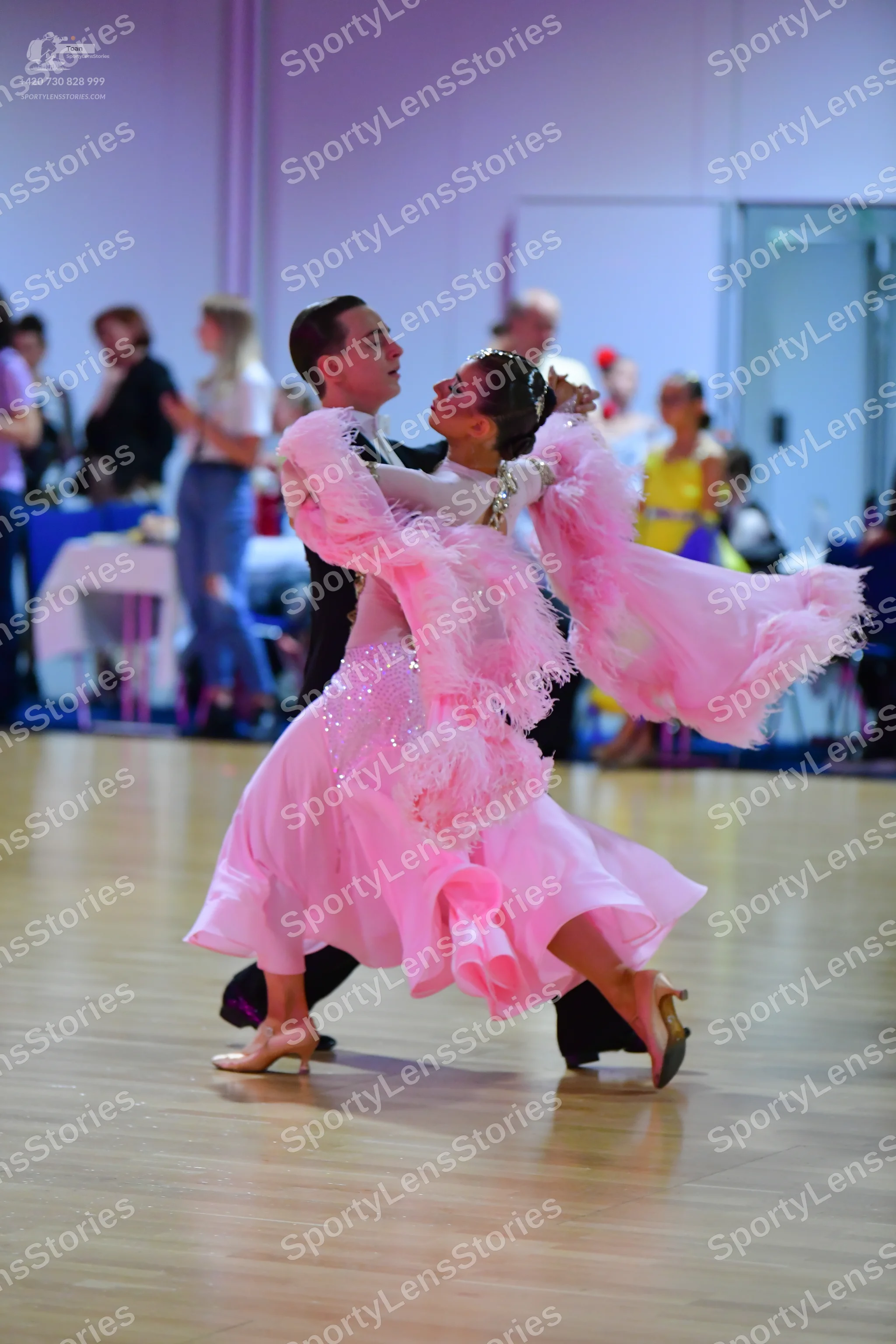 Dancesport competitor: Male dancer: black suit