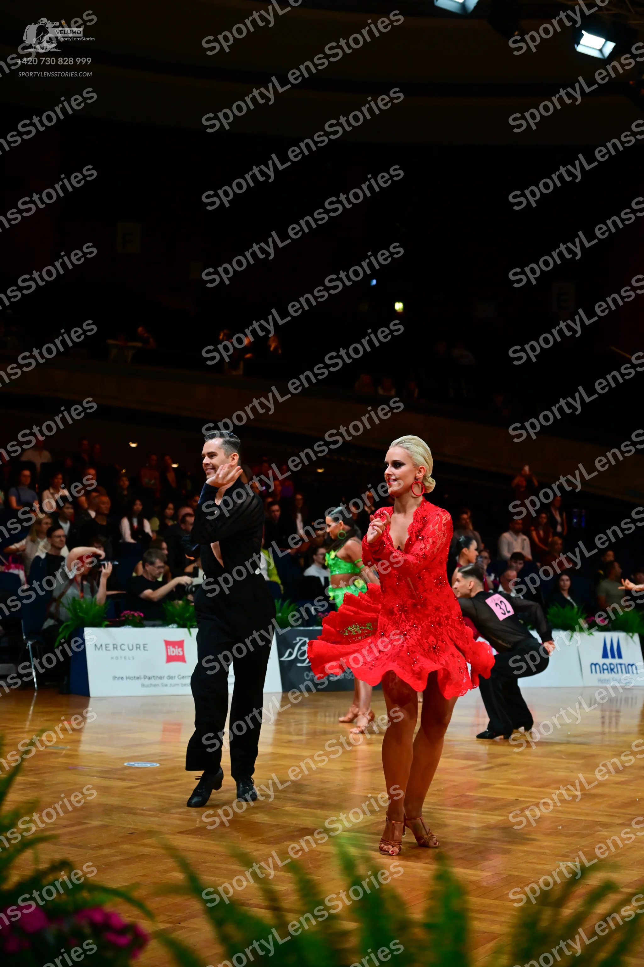 Dancesport competitor: Male dancer: black long-sleeved shirt and black trousers