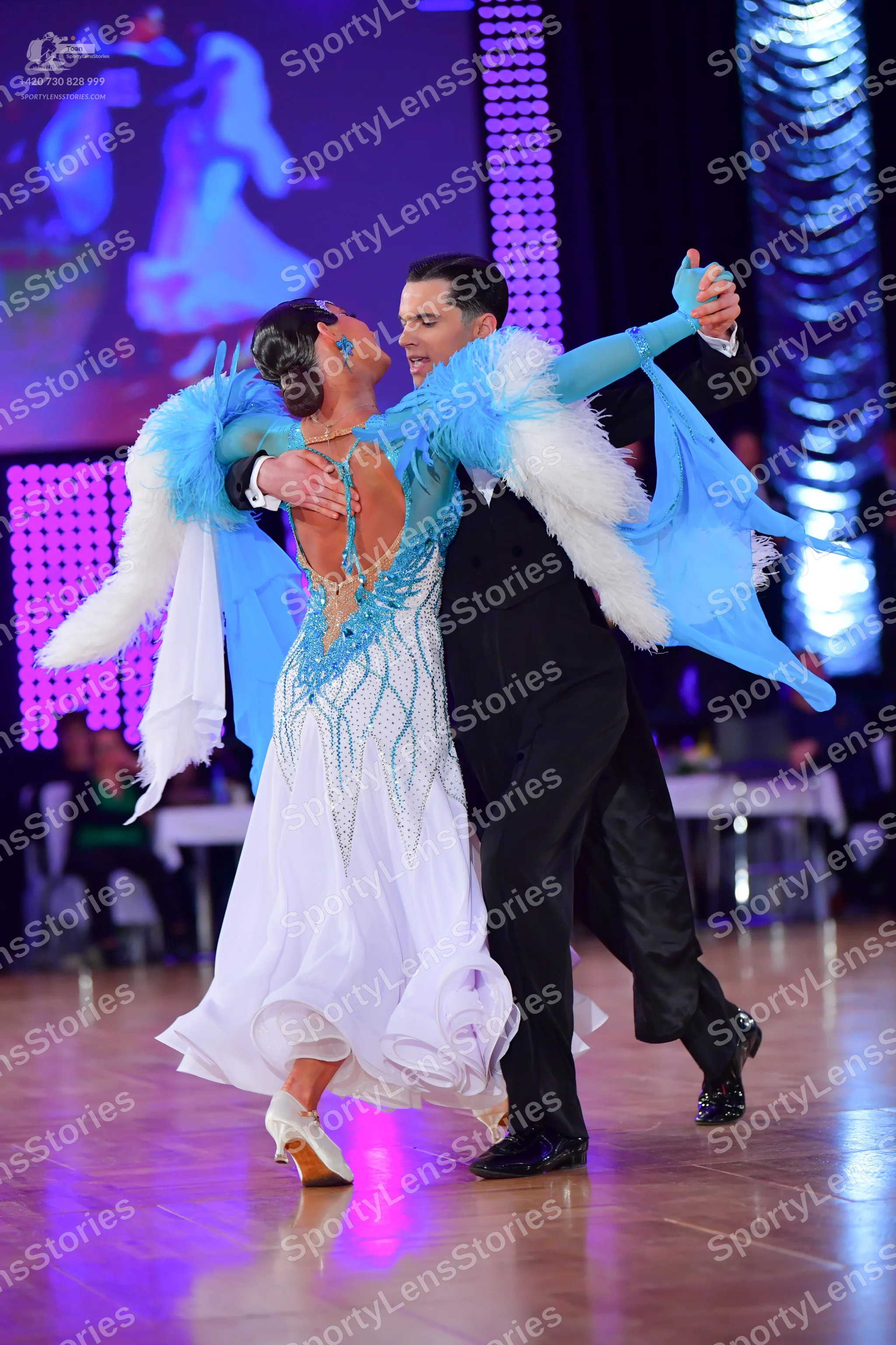 Dancesport competitor: Male dancer: black suit