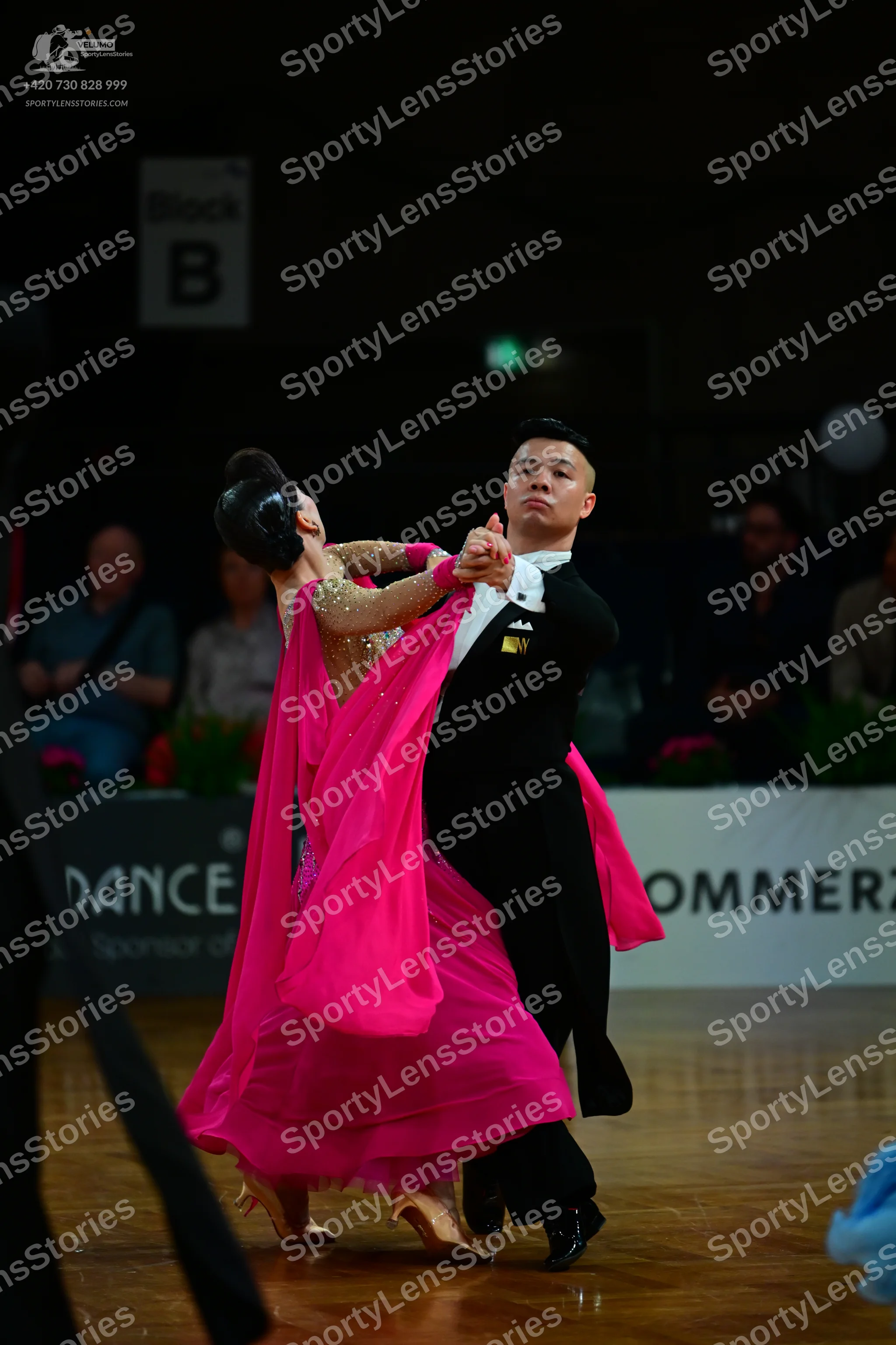 Dancesport competitor: Male dancer: black formal suit with a white shirt and black trousers