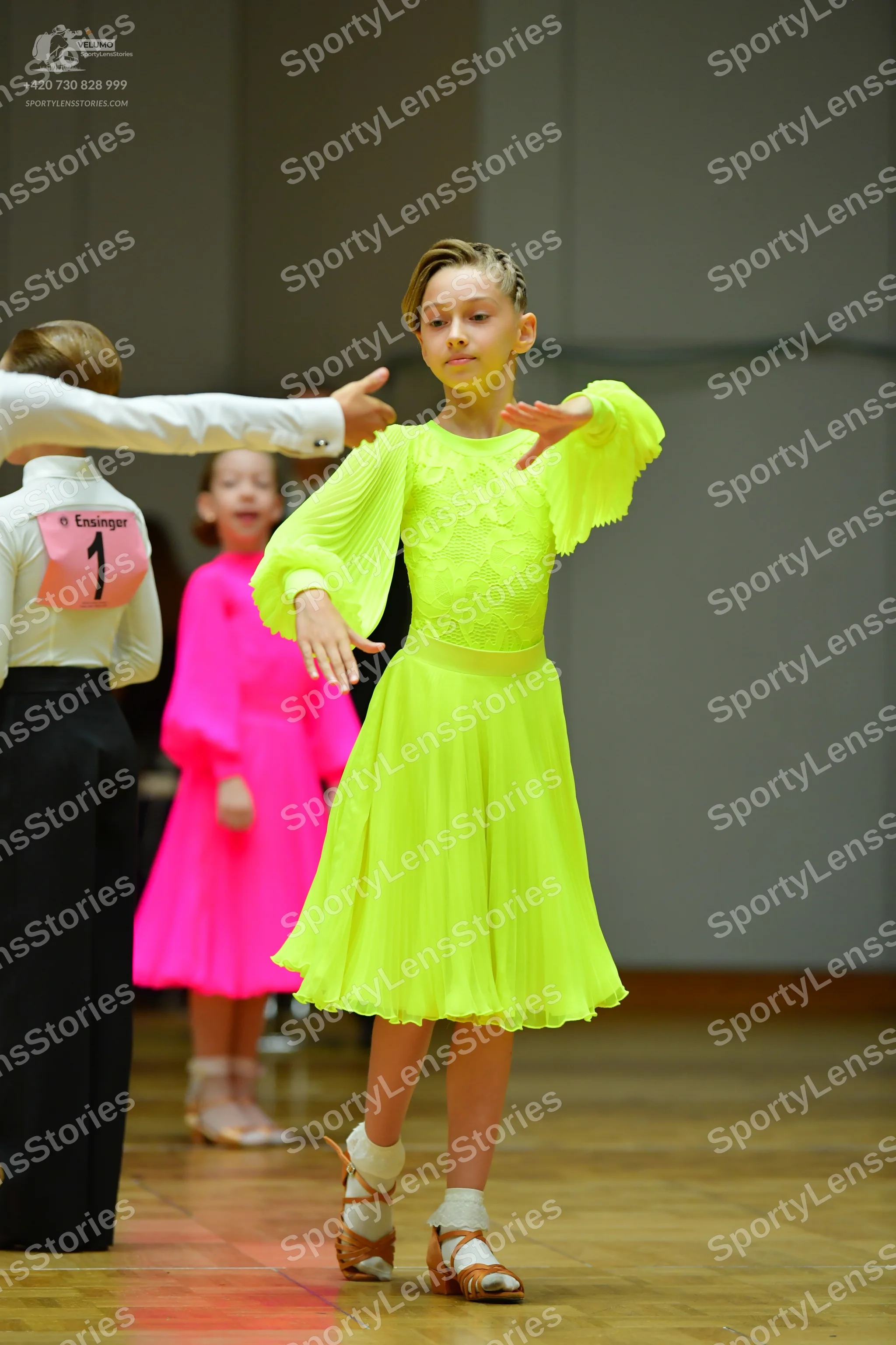 Dancesport competitor: Male dancer: white long-sleeved shirt and black trousers