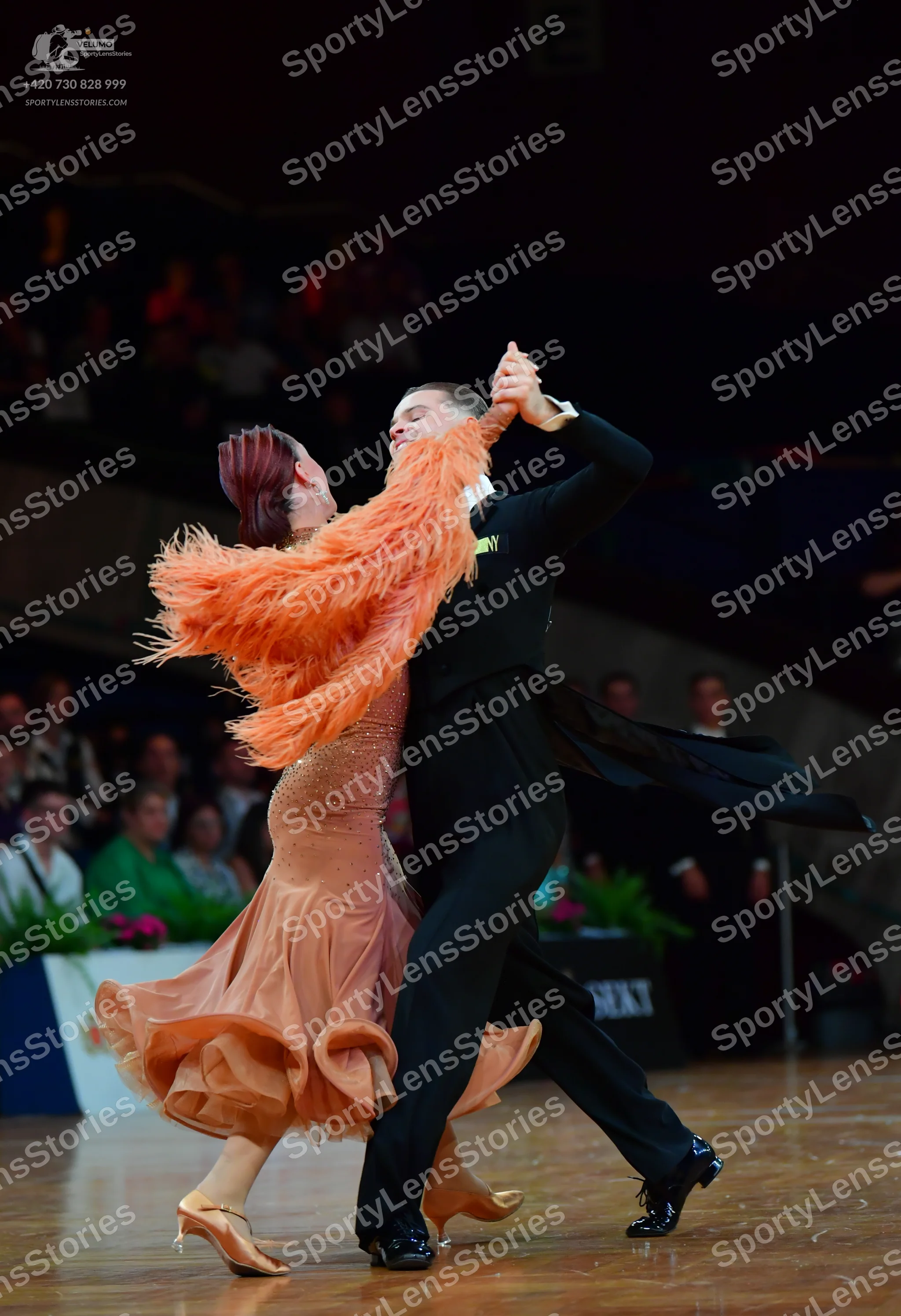 Dancesport competitor: Male dancer: black suit