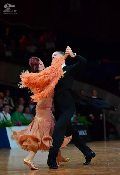 Dancesport competitor: Male dancer: black suit