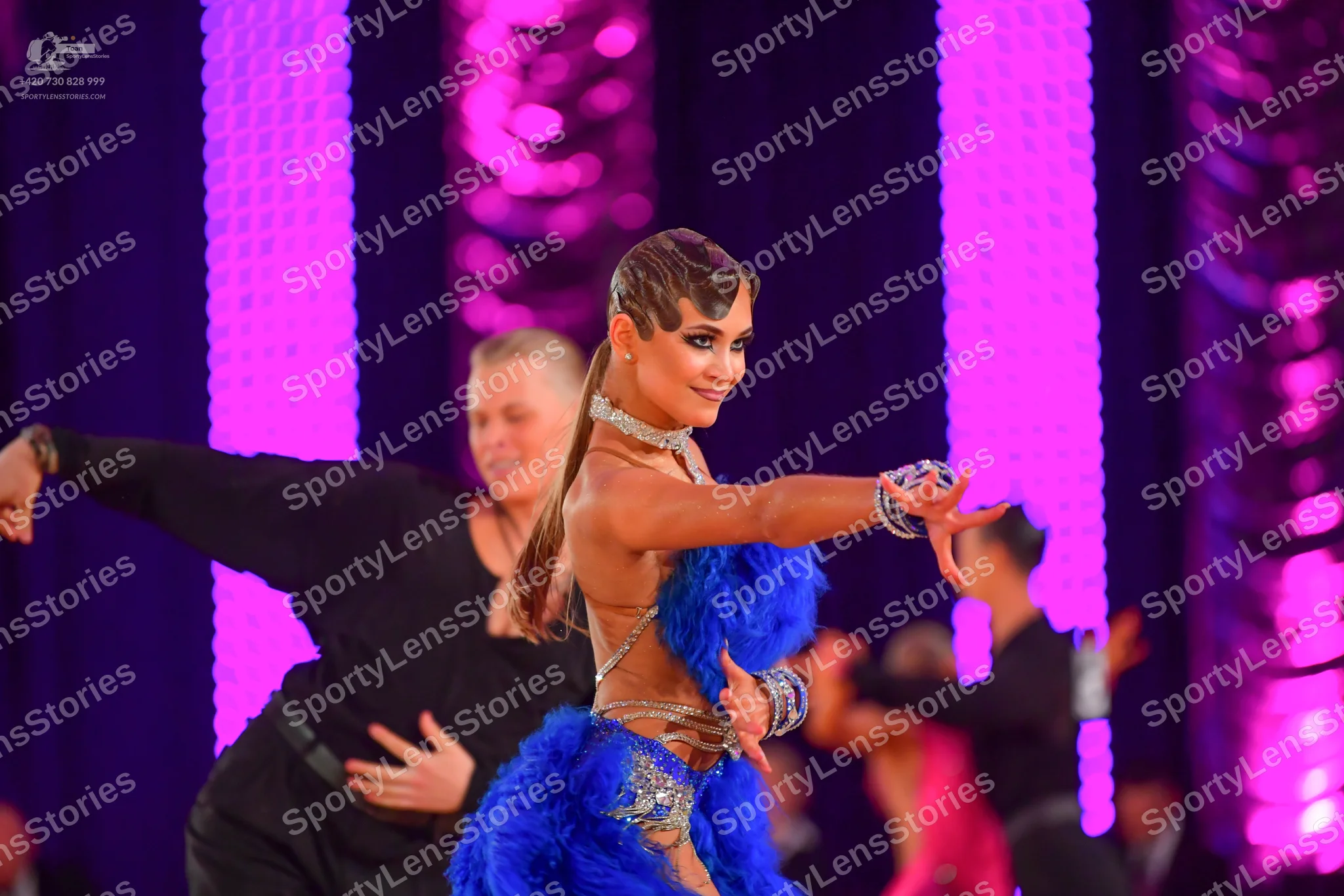 Dancesport competitor: Male dancer: black long-sleeved shirt and black trousers
