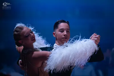 Dancesport competitor: Male dancer: black suit