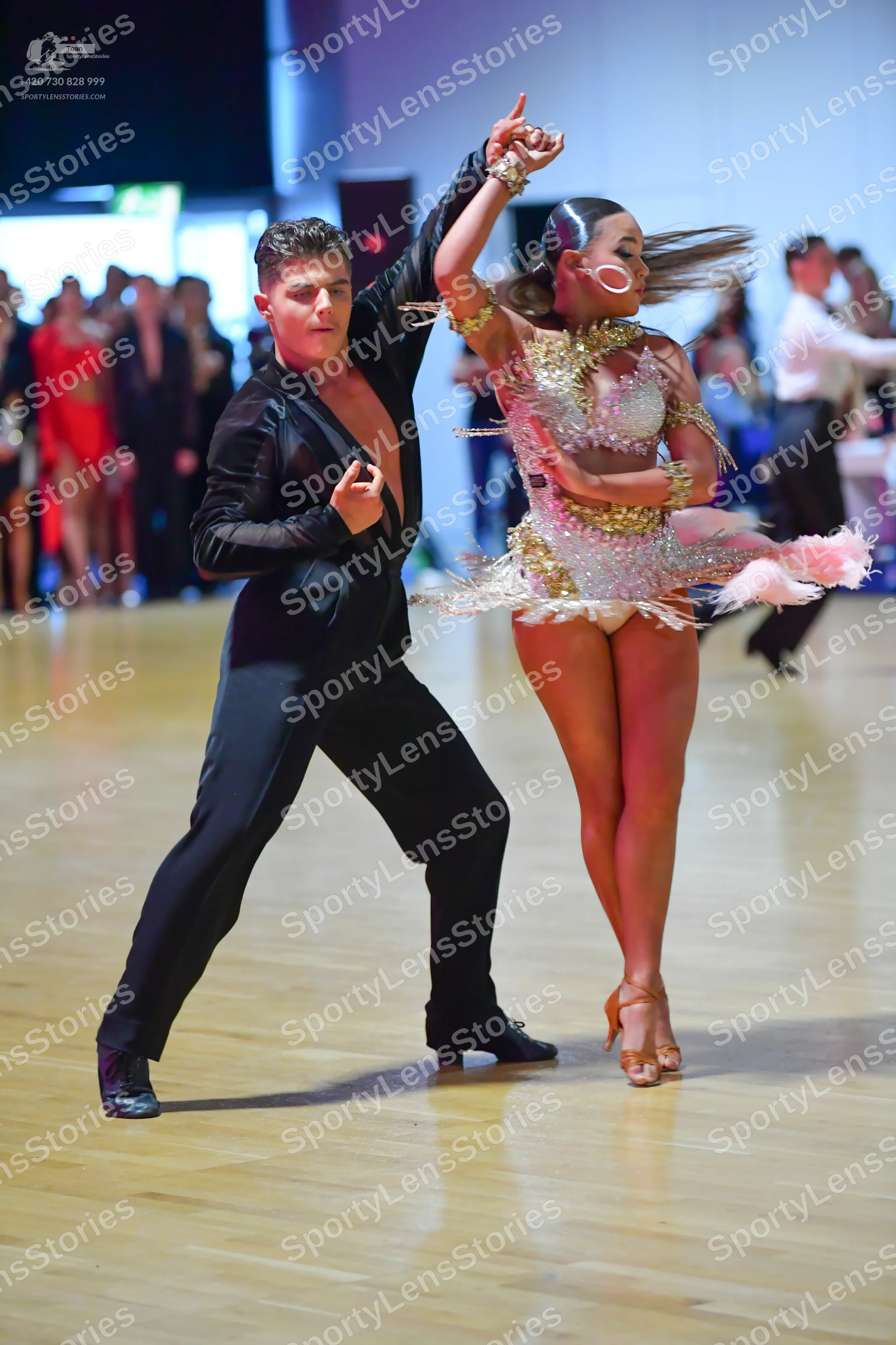 Dancesport competitor: Male dancer: black suit