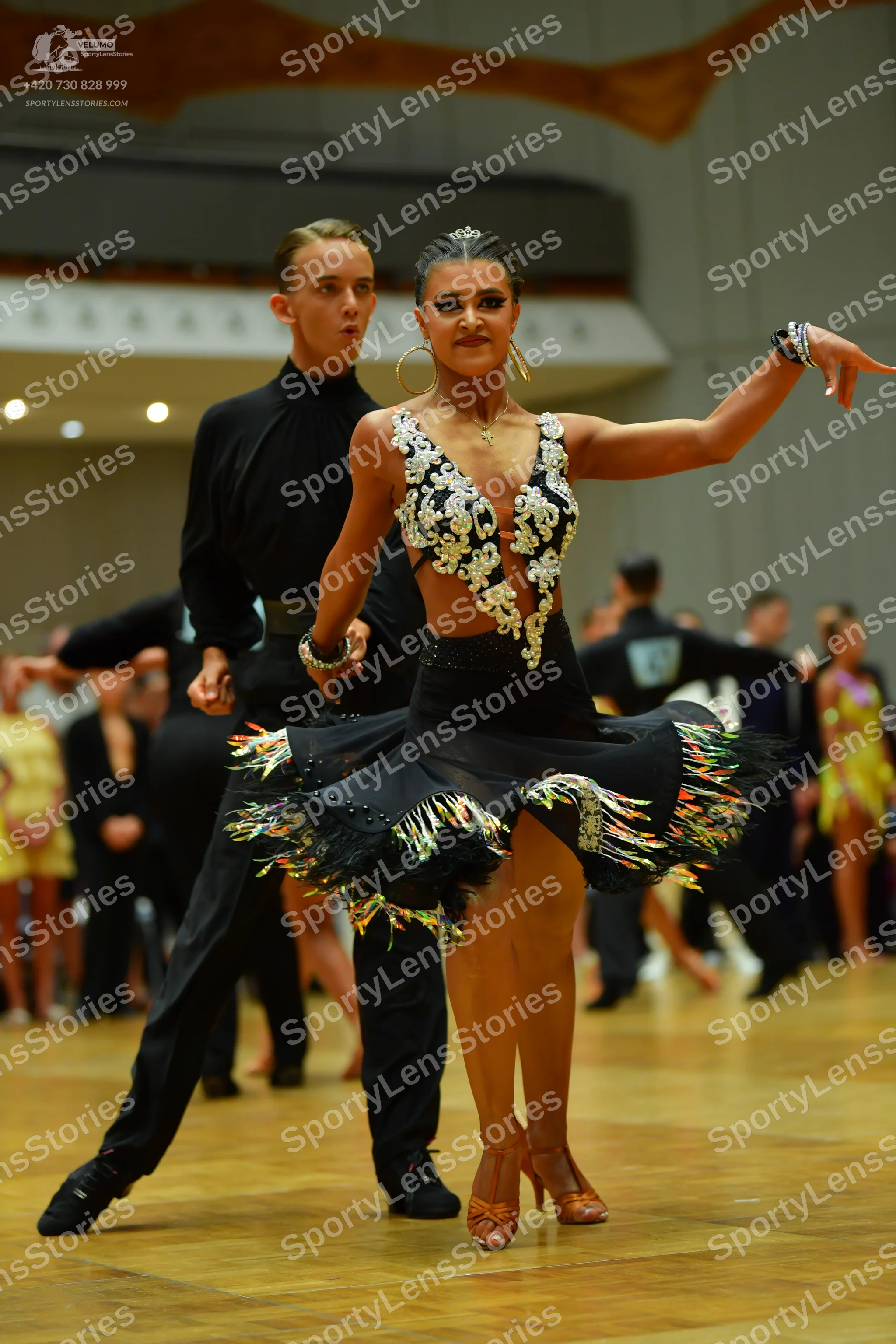 Dancesport competitor: Male dancer: black long-sleeved shirt and black trousers