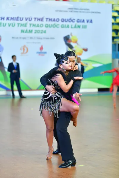 Dancesport competitor: ** Black Latin suit