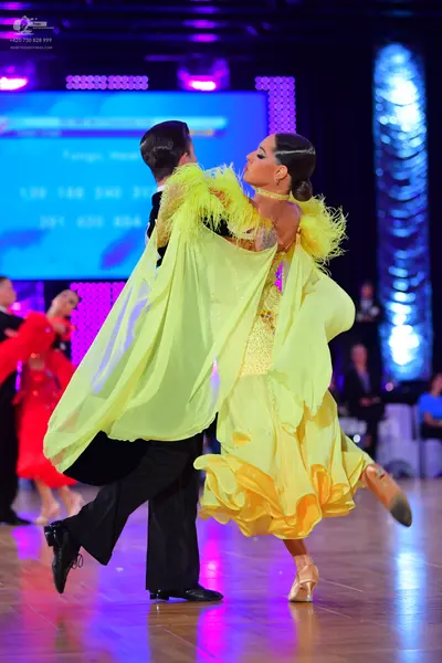 Dancesport competitor: Male dancer: black suit and trousers