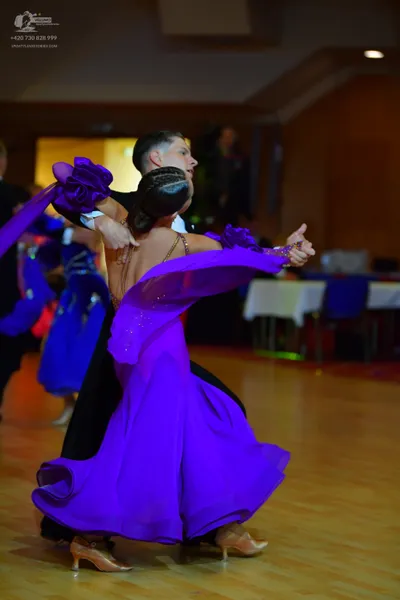 Dancesport competitor: Male dancer: black suit