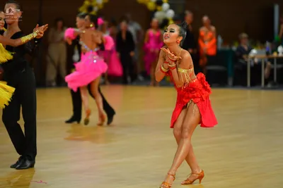 Dancesport competitor: ** Black tailsuit with sequin lapels