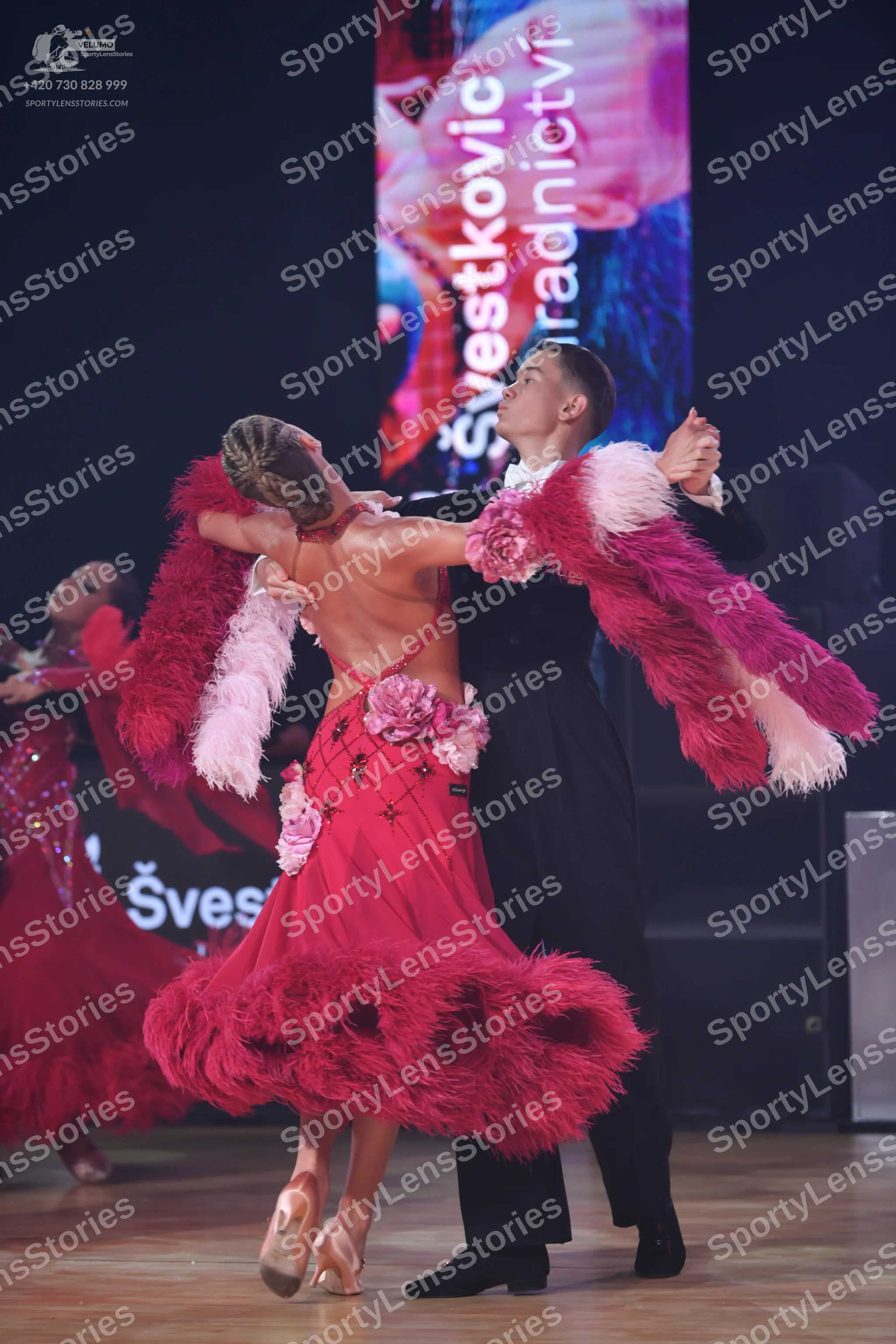 Dancesport competitor: Male dancer: black suit