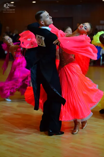 Dancesport competitor #90: Male dancer: black ballroom suit with black trousers