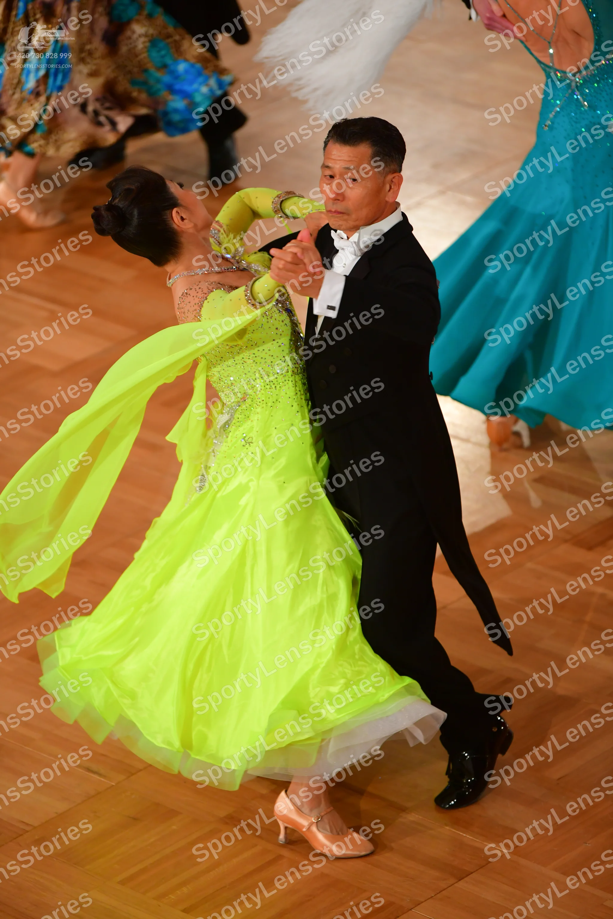 Dancesport competitor: Male dancer: black tailcoat suit with a white shirt and white bowtie
