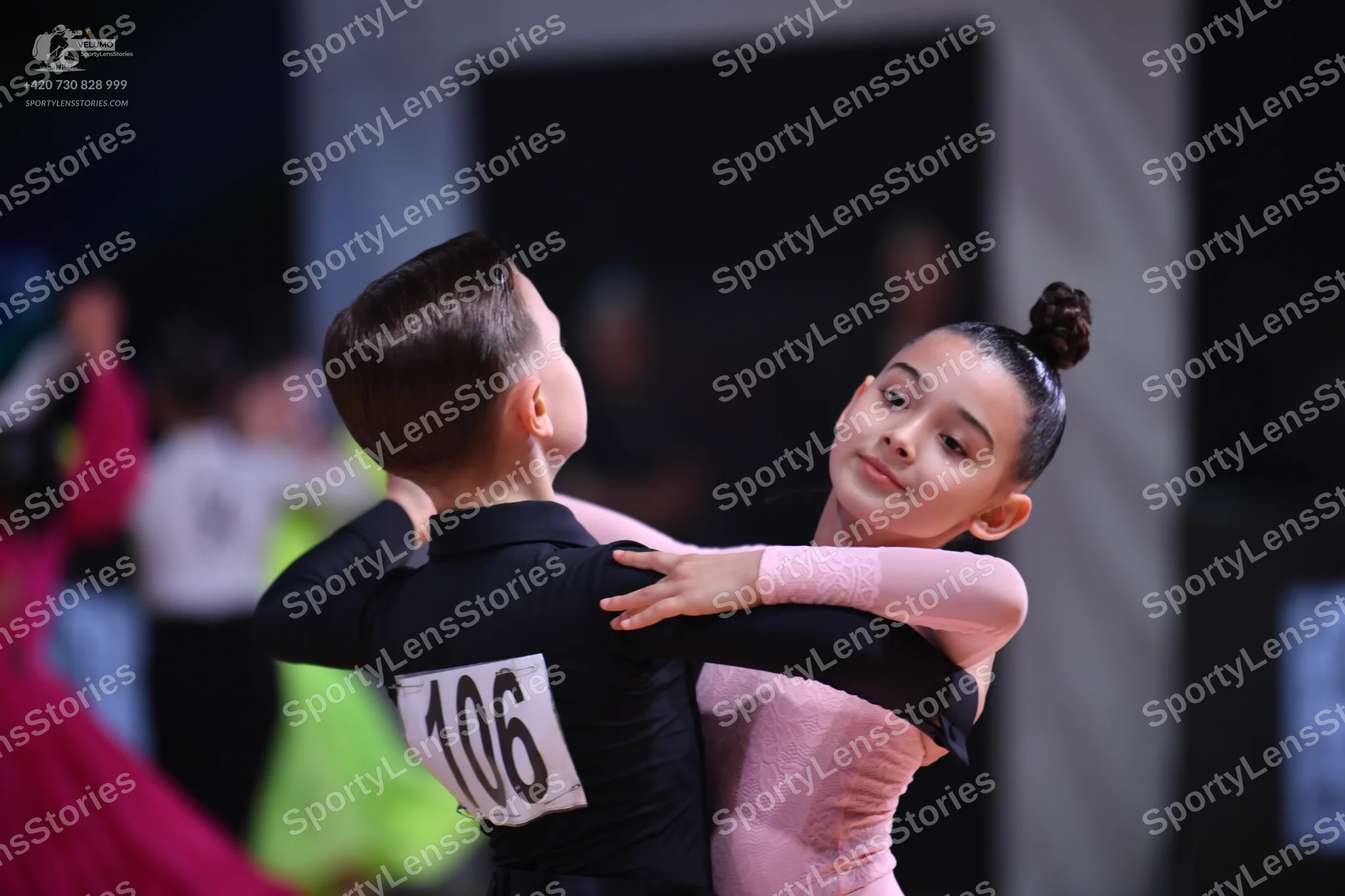 Dancesport competitor: Male dancer: black long-sleeved dance top