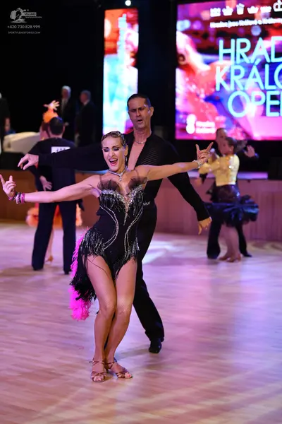 Dancesport competitor: ** Red Latin dress