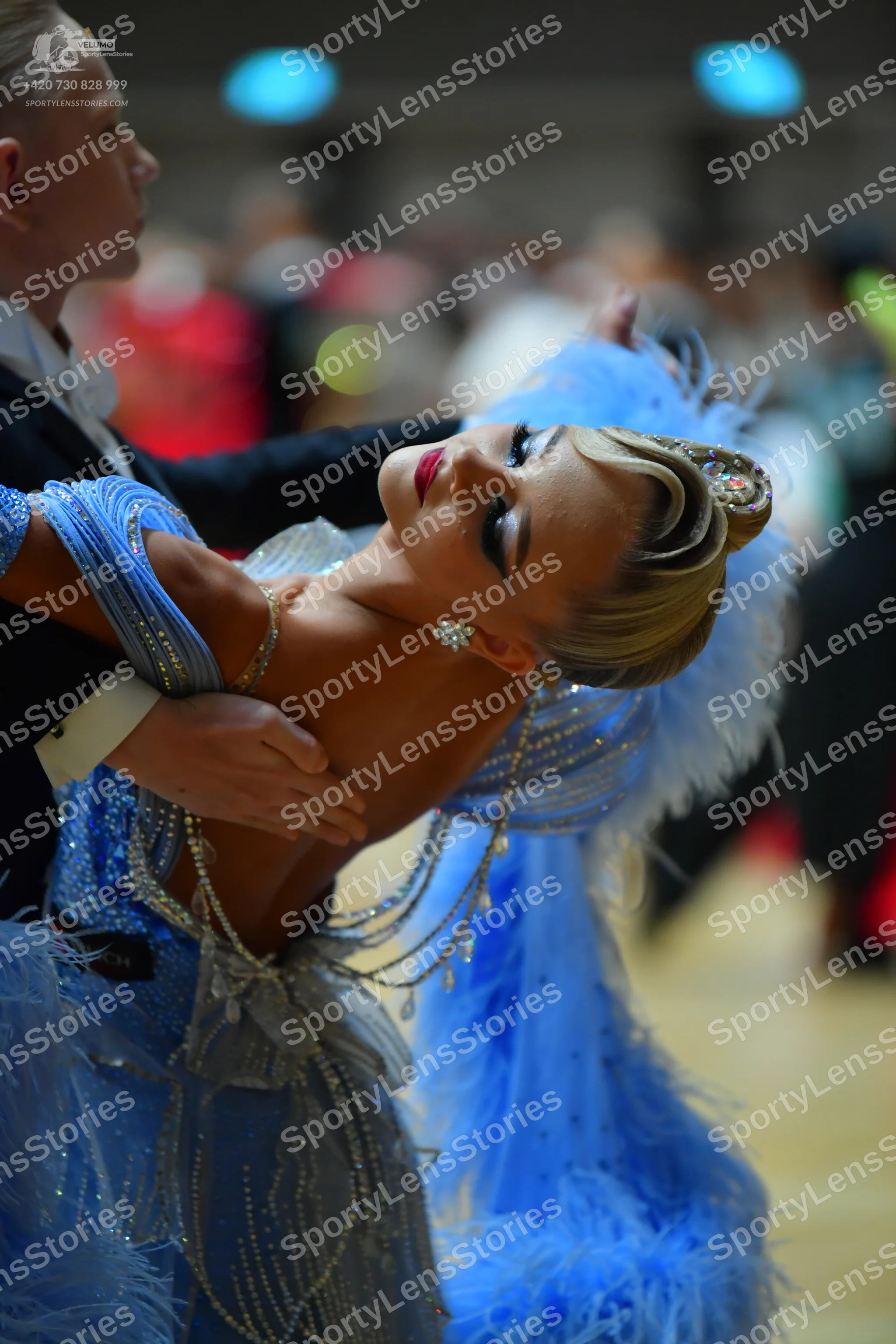 Dancesport competitor: Male dancer: black suit with a white shirt