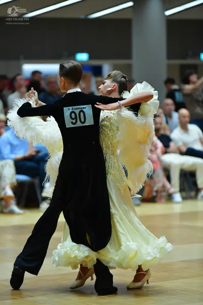 Dancesport competitor #90: Male dancer: black long-sleeved top and black trousers