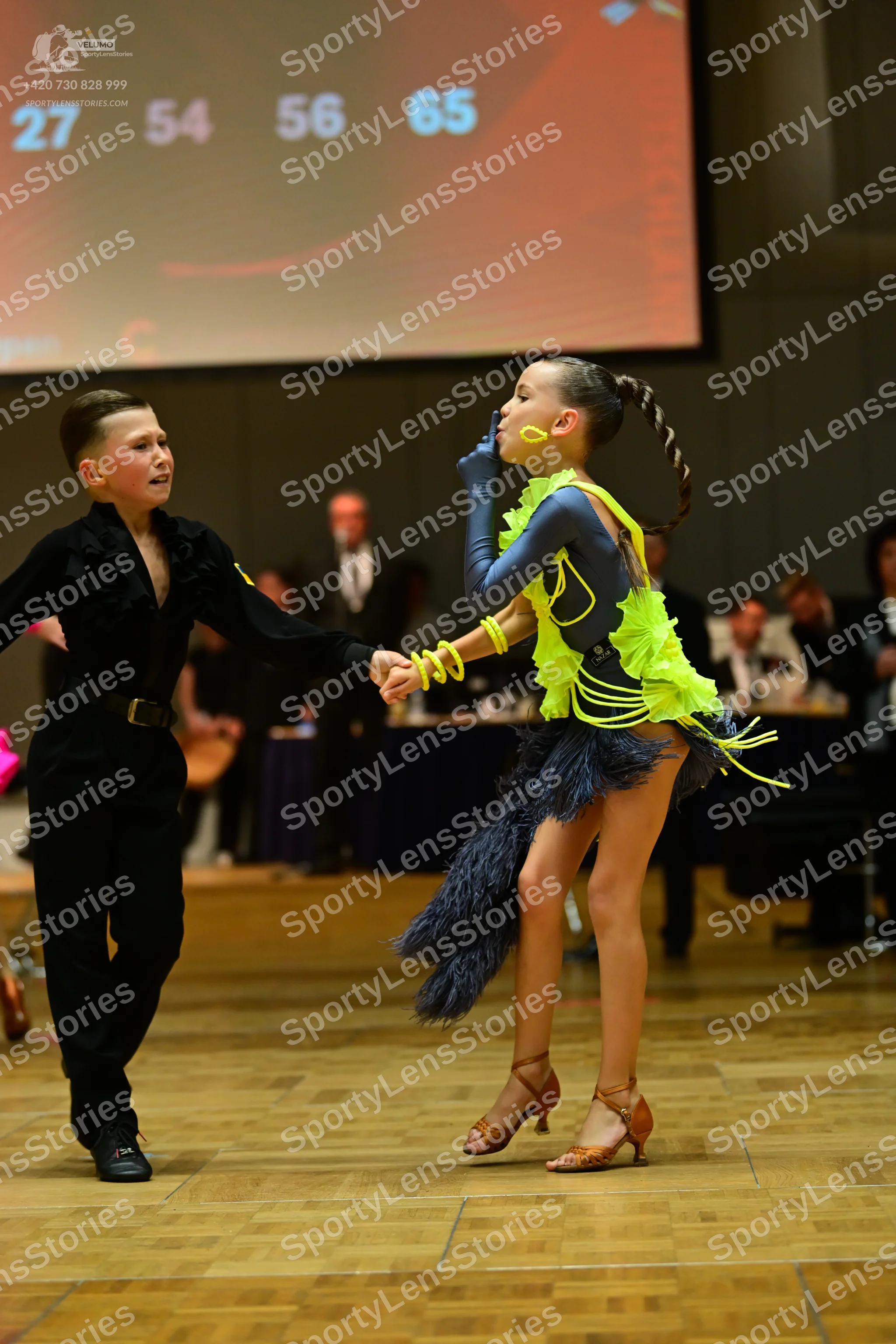 Dancesport competitor: Male dancer: black long-sleeved shirt and black trousers