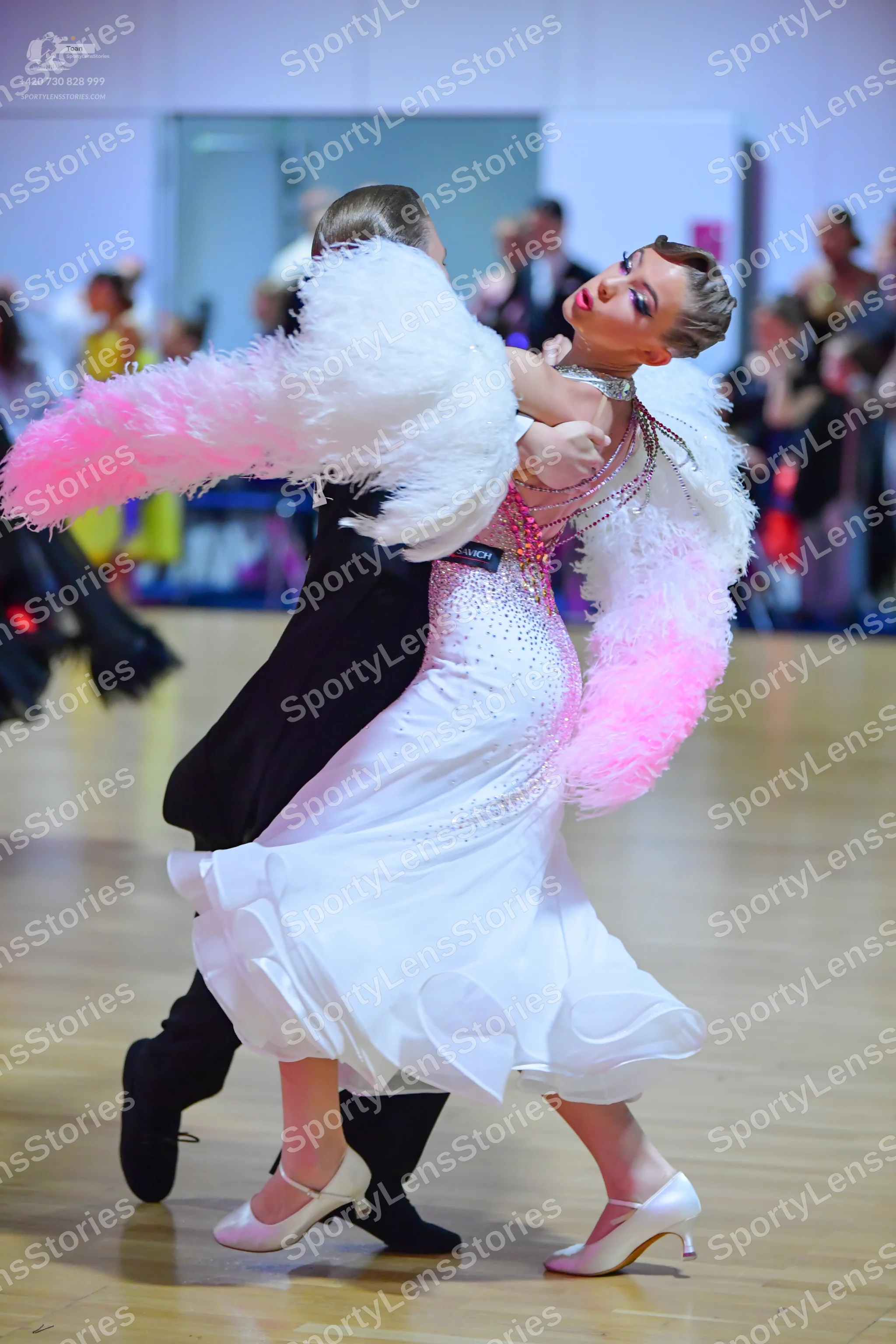 Dancesport competitor: Male dancer: black suit